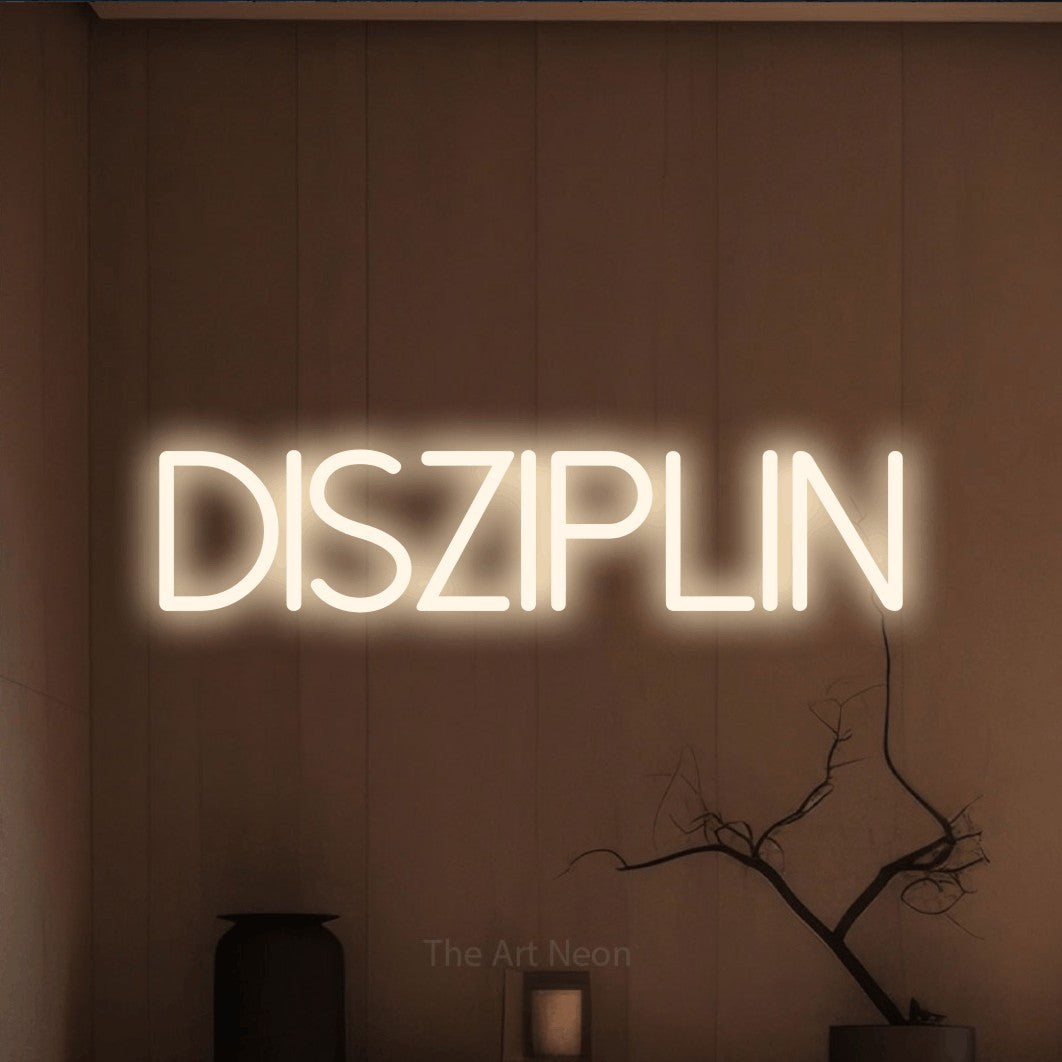 LED neon sign reading “DISZIPLIN”, arranged in a single line.