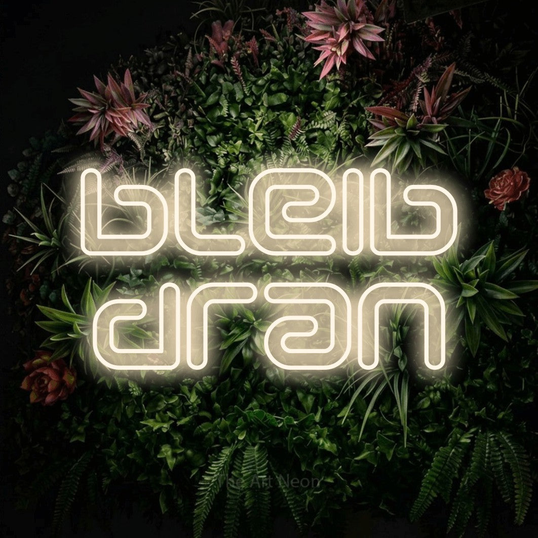 LED neon sign reading “bleib dran”, arranged in 2 lines.