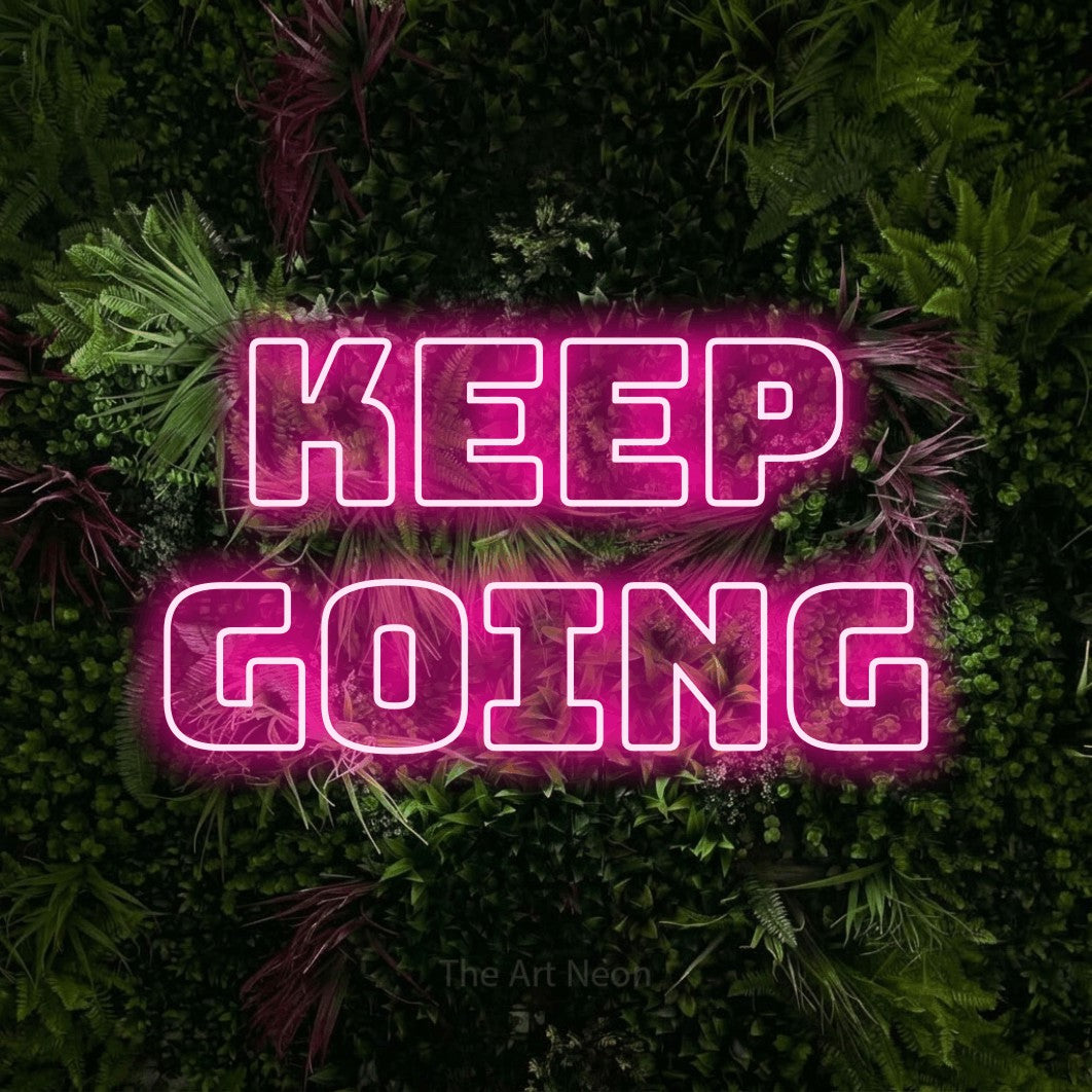 LED neon sign reading “Keep going”, arranged in 2 lines.