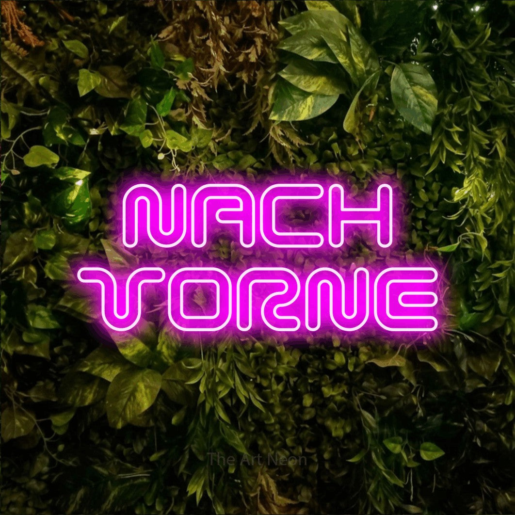 LED neon sign reading “NACH VORNE”, arranged in 2 lines.