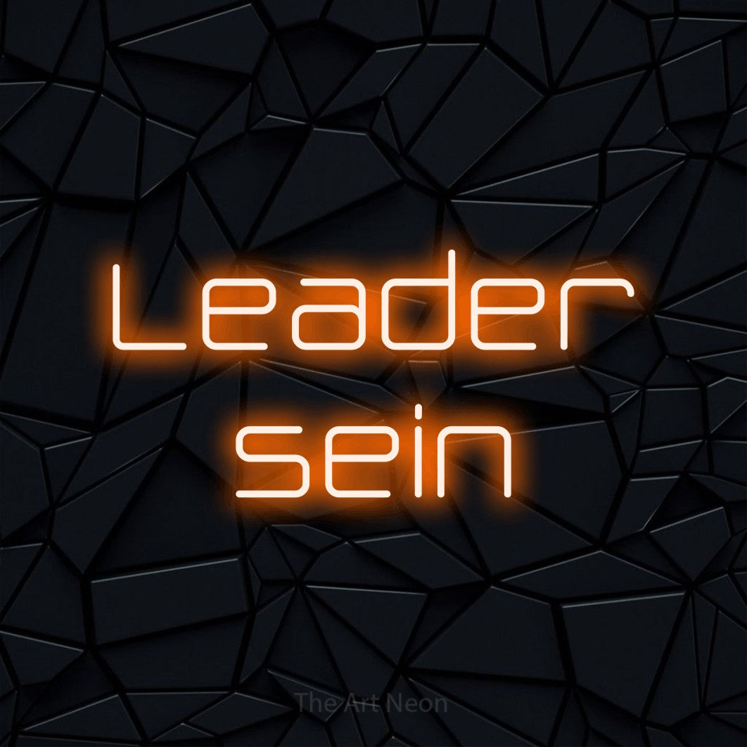 LED neon sign reading “Leader sein”, arranged in 2 lines.