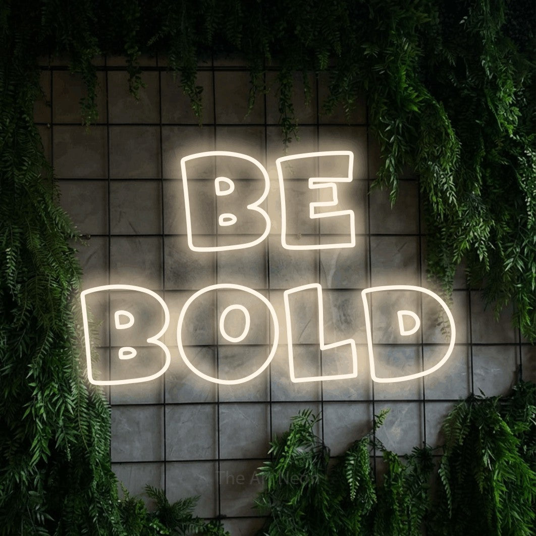 LED neon sign reading “BE BOLD”, arranged in 2 lines.