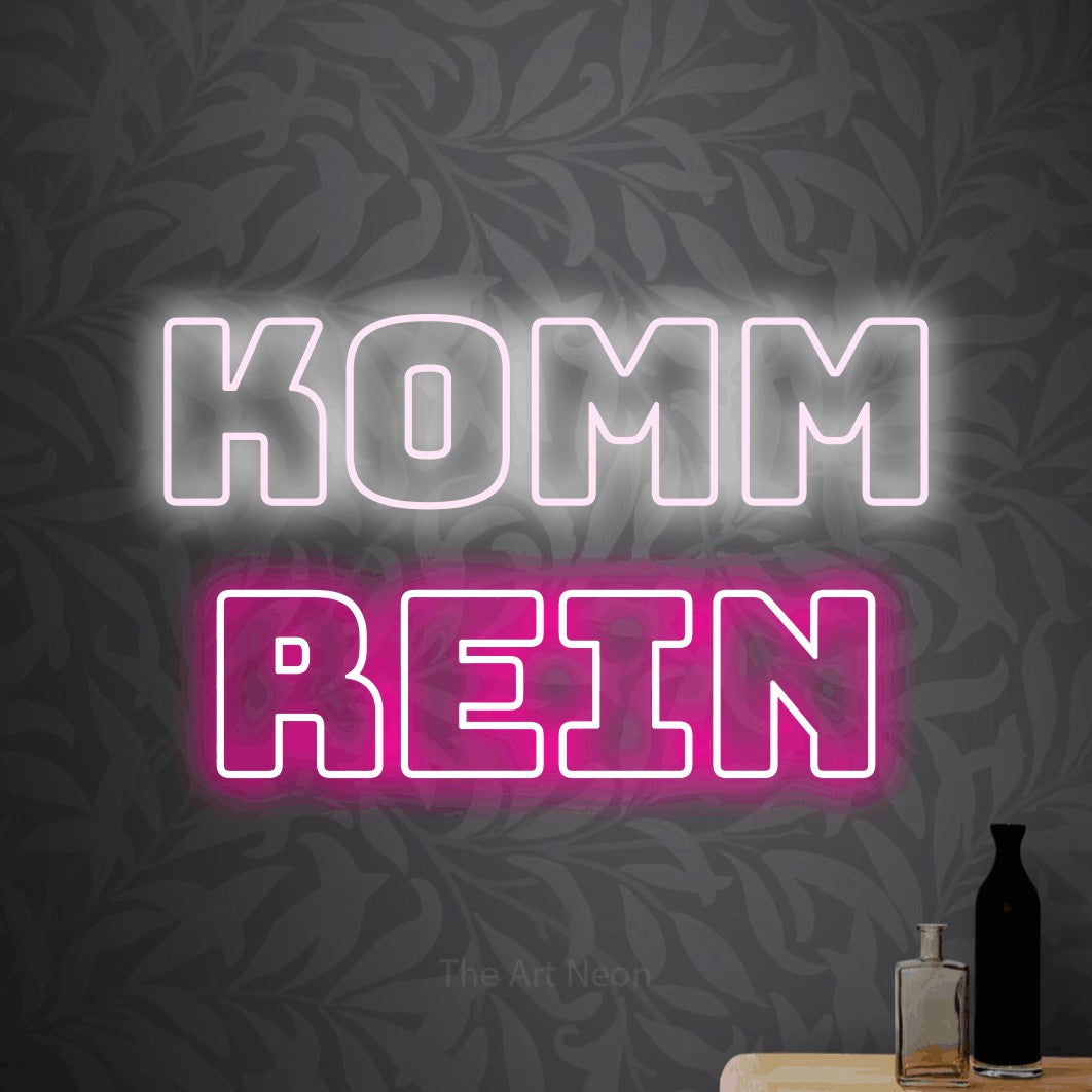 LED neon sign reading “Komm rein”, arranged in 2 lines.