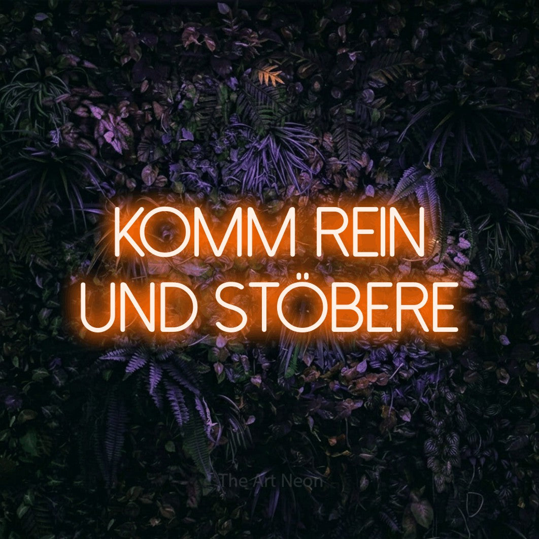 LED neon sign reading “Komm rein und stöbere”, arranged in 2 lines.