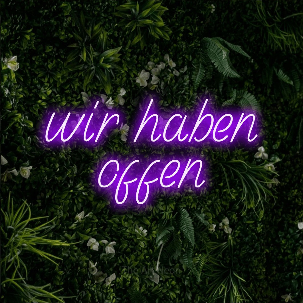 LED neon sign reading “wir haben offen”, arranged in 2 lines.