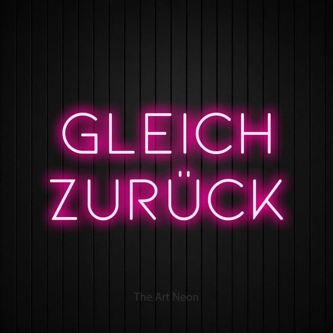 LED neon sign reading “Gleich zurück”, arranged in 2 lines.