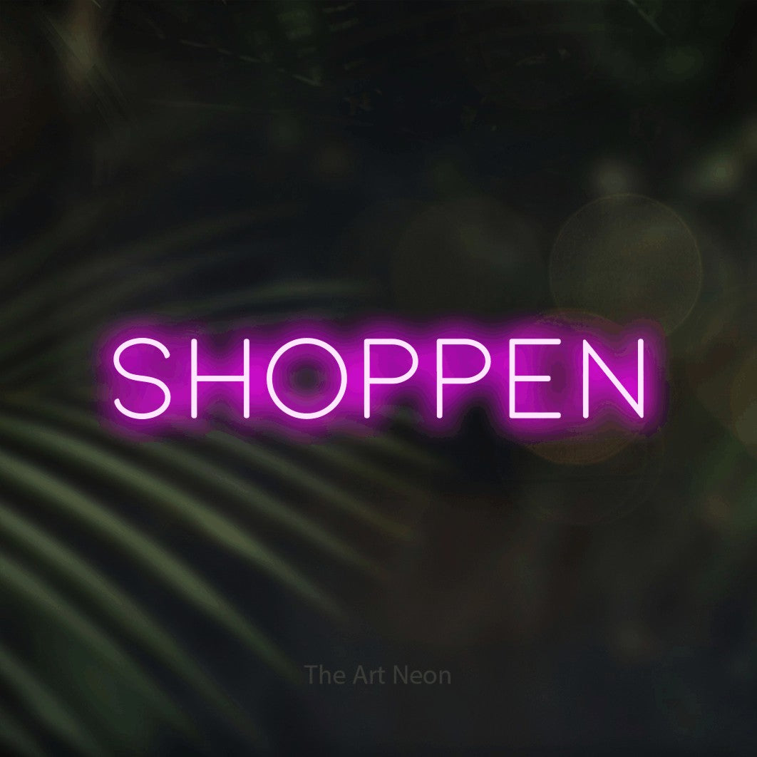 LED neon sign reading “Shoppen”, arranged in a single line.