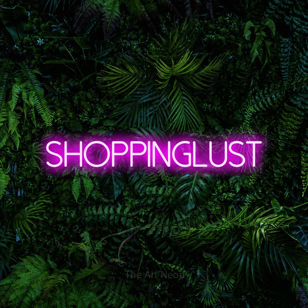 LED neon sign reading “shoppinglust”, arranged in a single line.