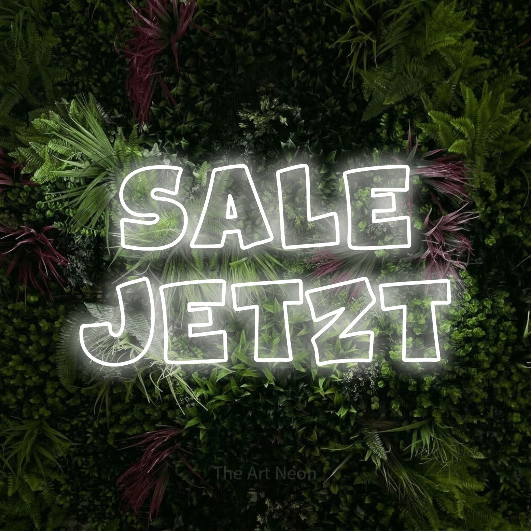 LED neon sign reading “sale jetzt”, arranged in 2 lines.