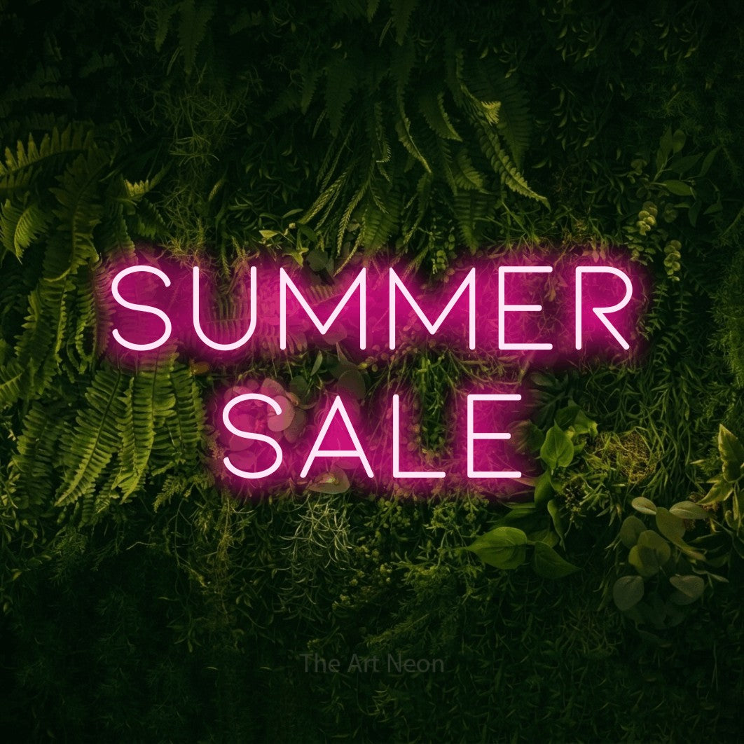 LED neon sign reading “Summer Sale”, arranged in 2 lines.