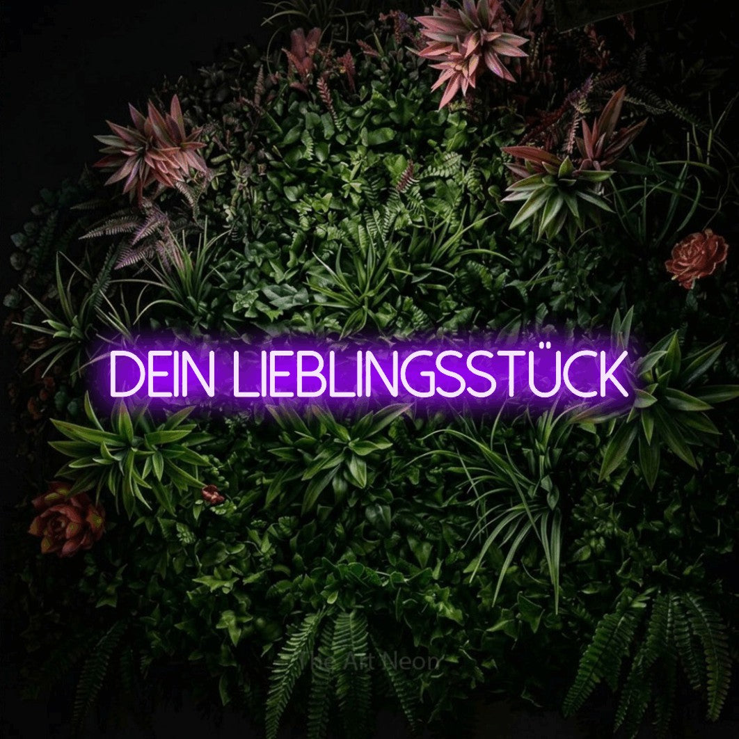 LED neon sign reading “dein LIEBLINGSSTÜCK”, arranged in a single line.
