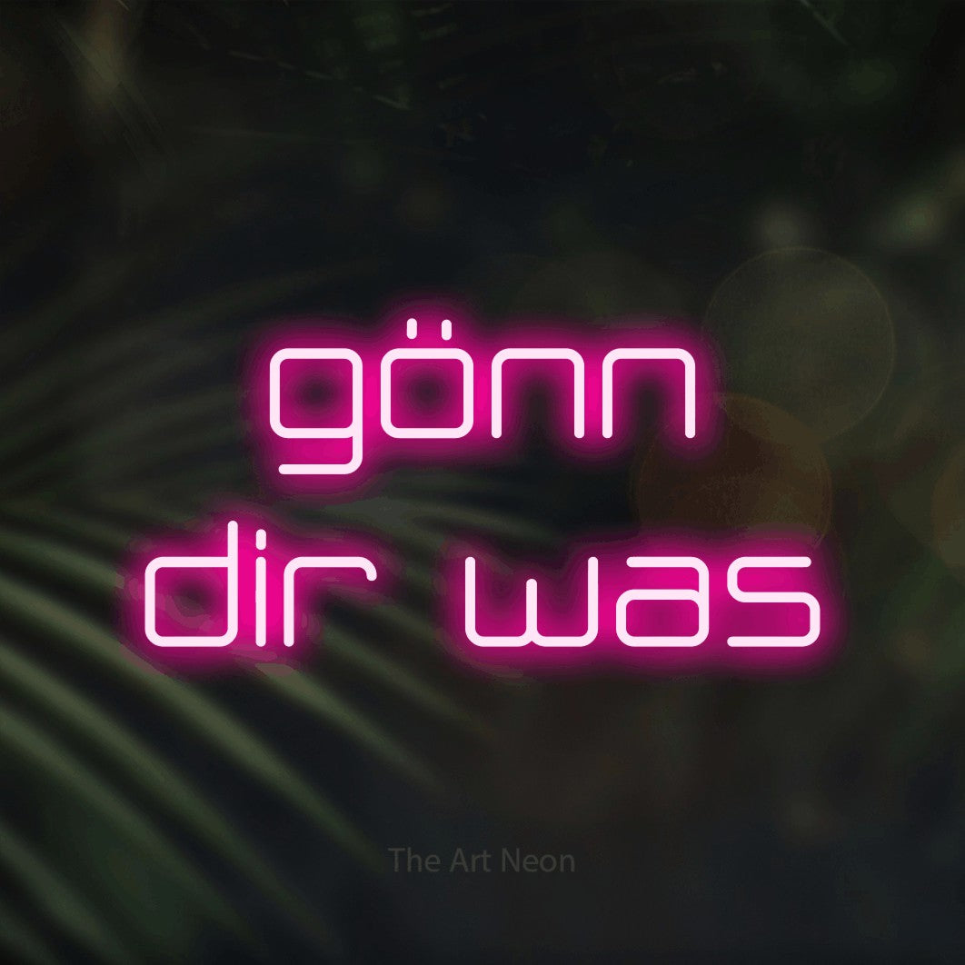 LED neon sign reading “gönn dir was”, arranged in 2 lines.