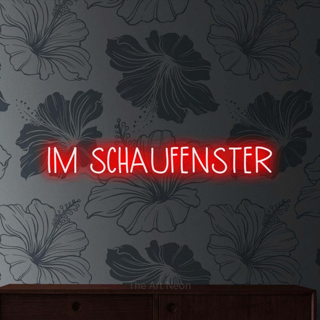 LED neon sign reading “IM SCHAUFENSTER”, arranged in a single line.