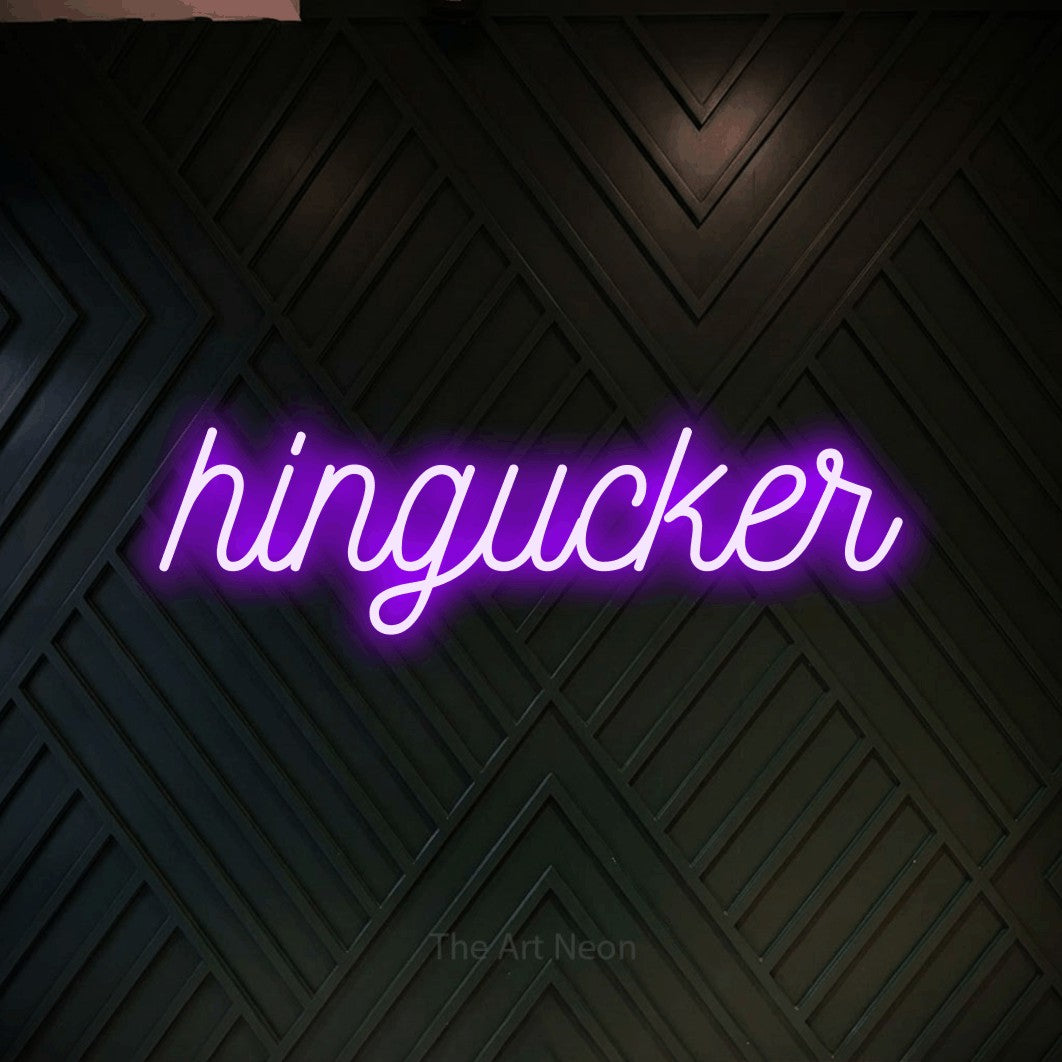 LED neon sign reading “hingucker”, arranged in a single line.
