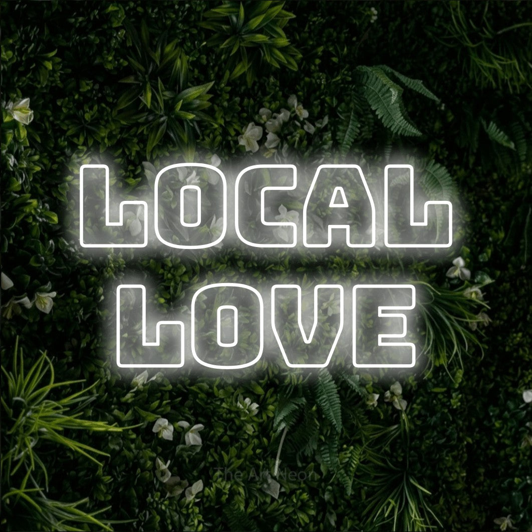 LED neon sign reading “Local Love”, arranged in 2 lines.