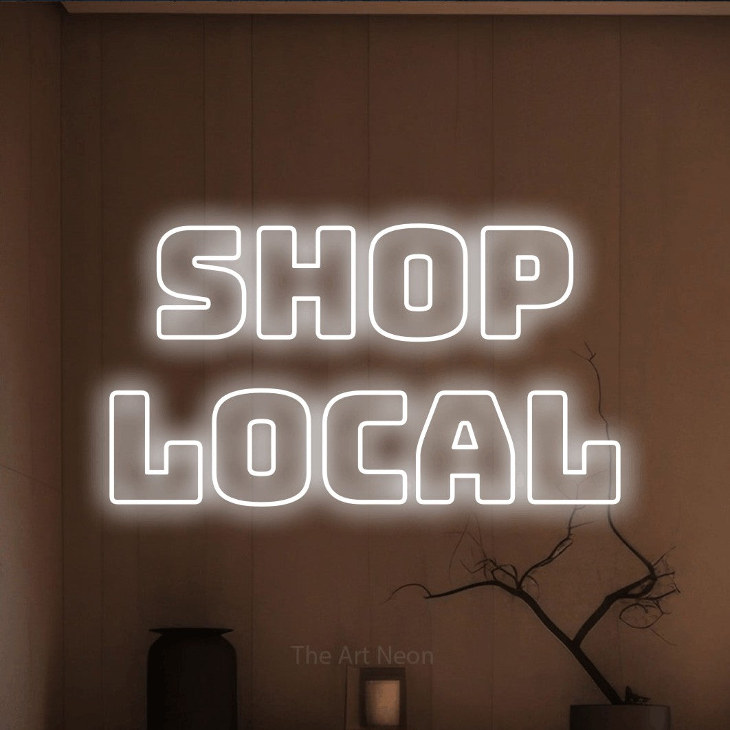 LED neon sign reading “Shop Local”, arranged in 2 lines.
