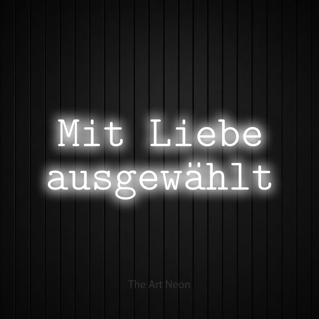 LED neon sign reading “Mit Liebe ausgewählt”, arranged in 2 lines.