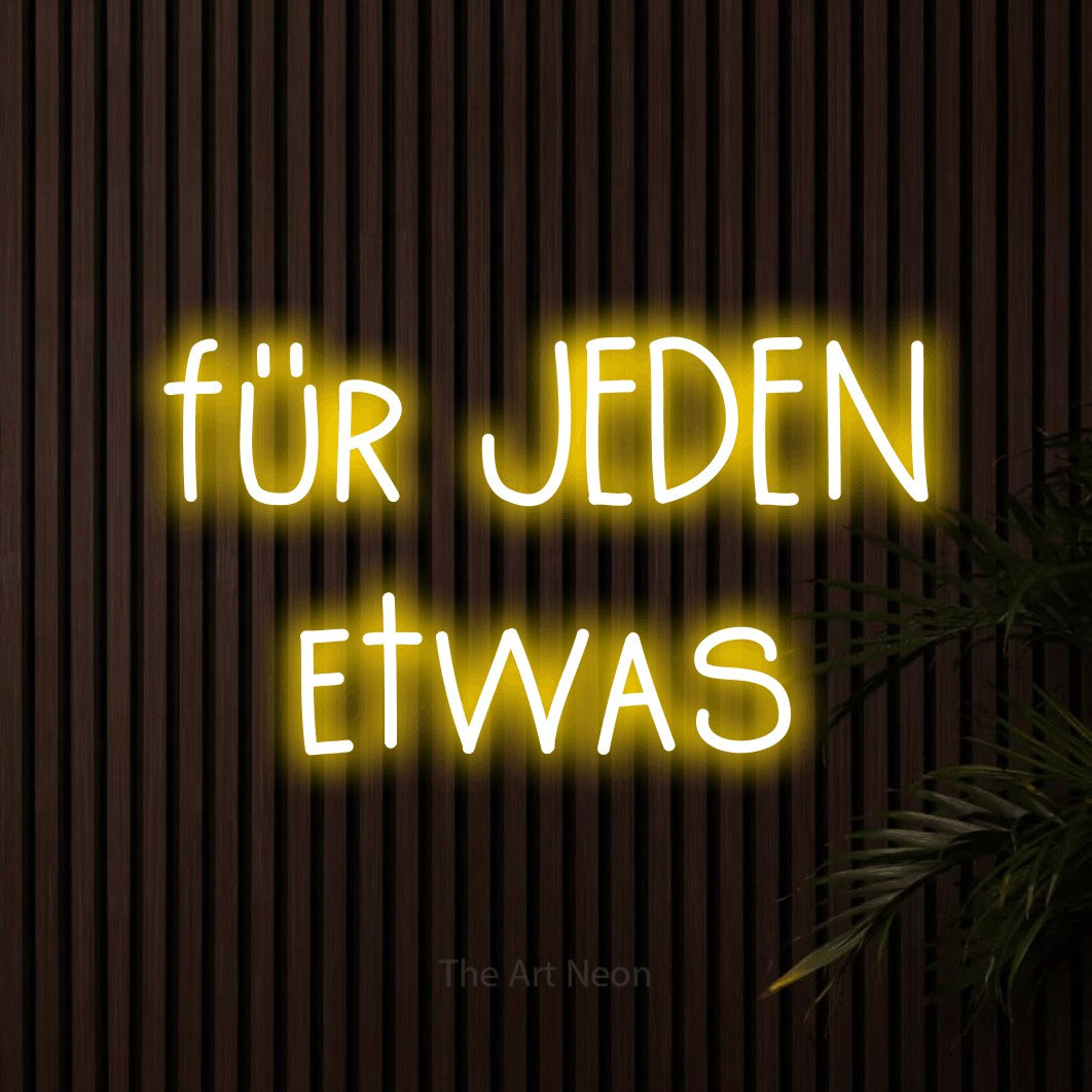 LED neon sign reading “für JEDEN etwas”, arranged in 2 lines.