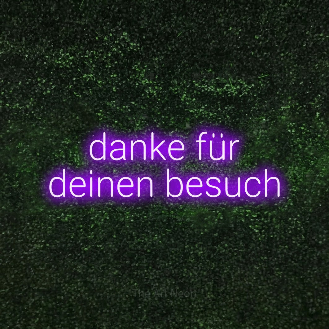 LED neon sign reading “danke für deinen besuch”, arranged in 2 lines.