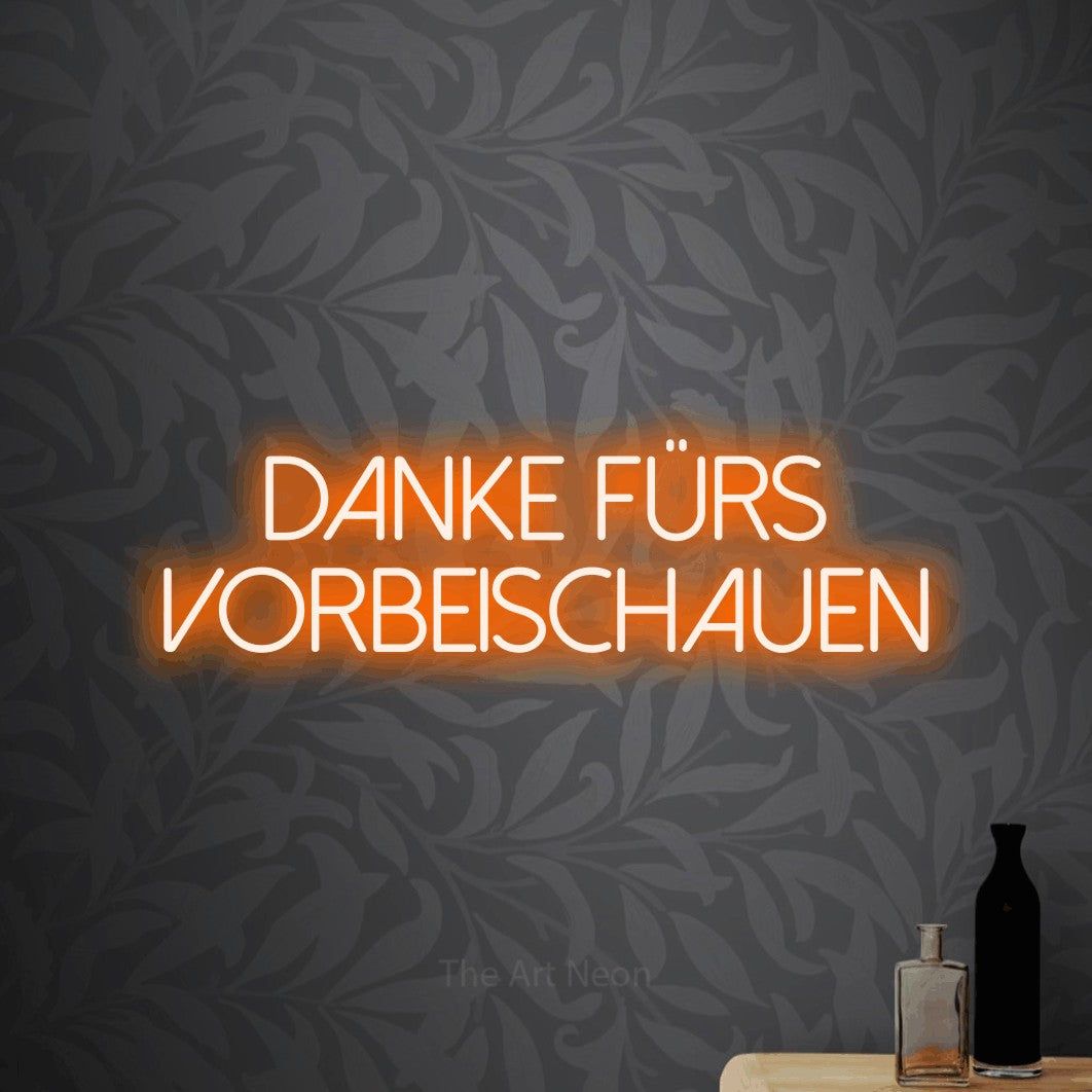 LED neon sign reading “Danke fürs Vorbeischauen”, arranged in 2 lines.