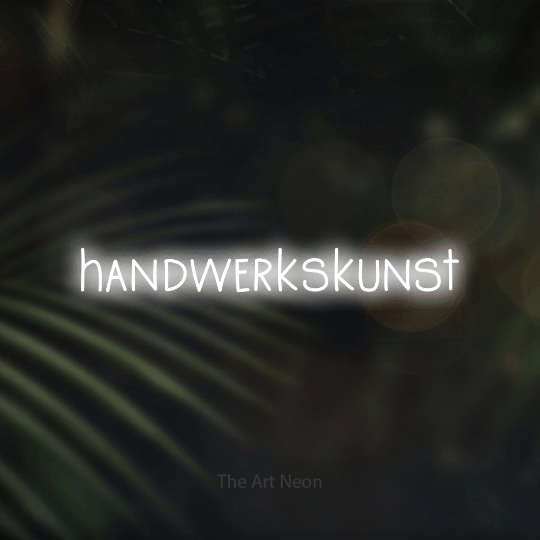 LED neon sign reading “handwerkskunst”, arranged in a single line.