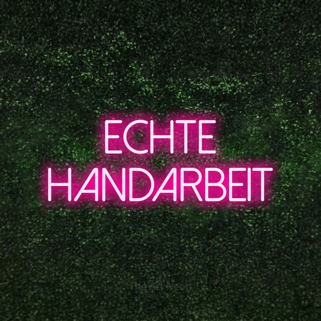 LED neon sign reading “Echte Handarbeit”, arranged in 2 lines.