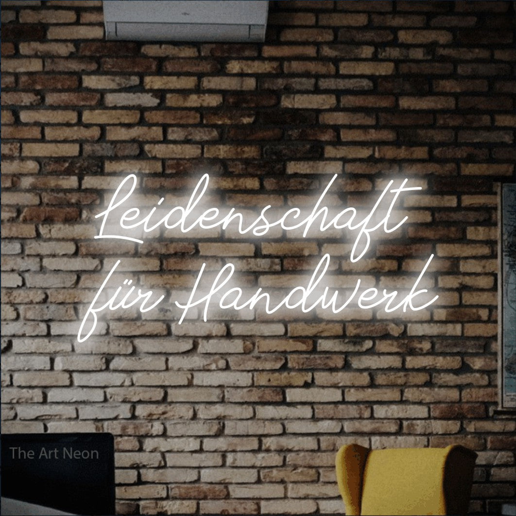 LED neon sign reading “Leidenschaft für Handwerk”, arranged in 2 lines.