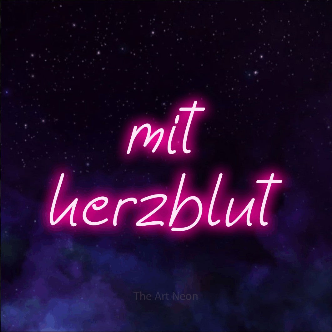 LED neon sign reading “mit herzblut”, arranged in 2 lines.
