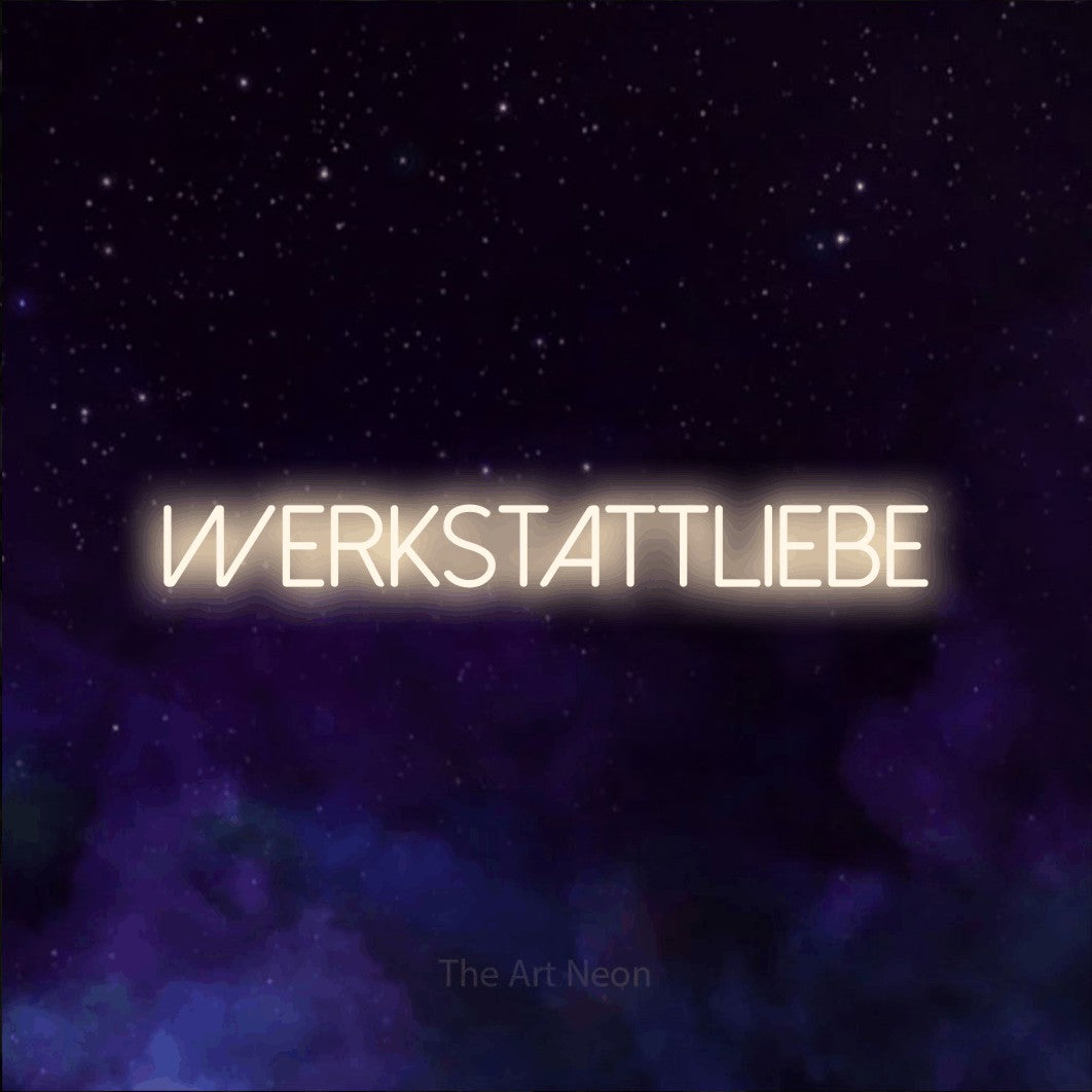 LED neon sign reading “Werkstattliebe”, arranged in a single line.