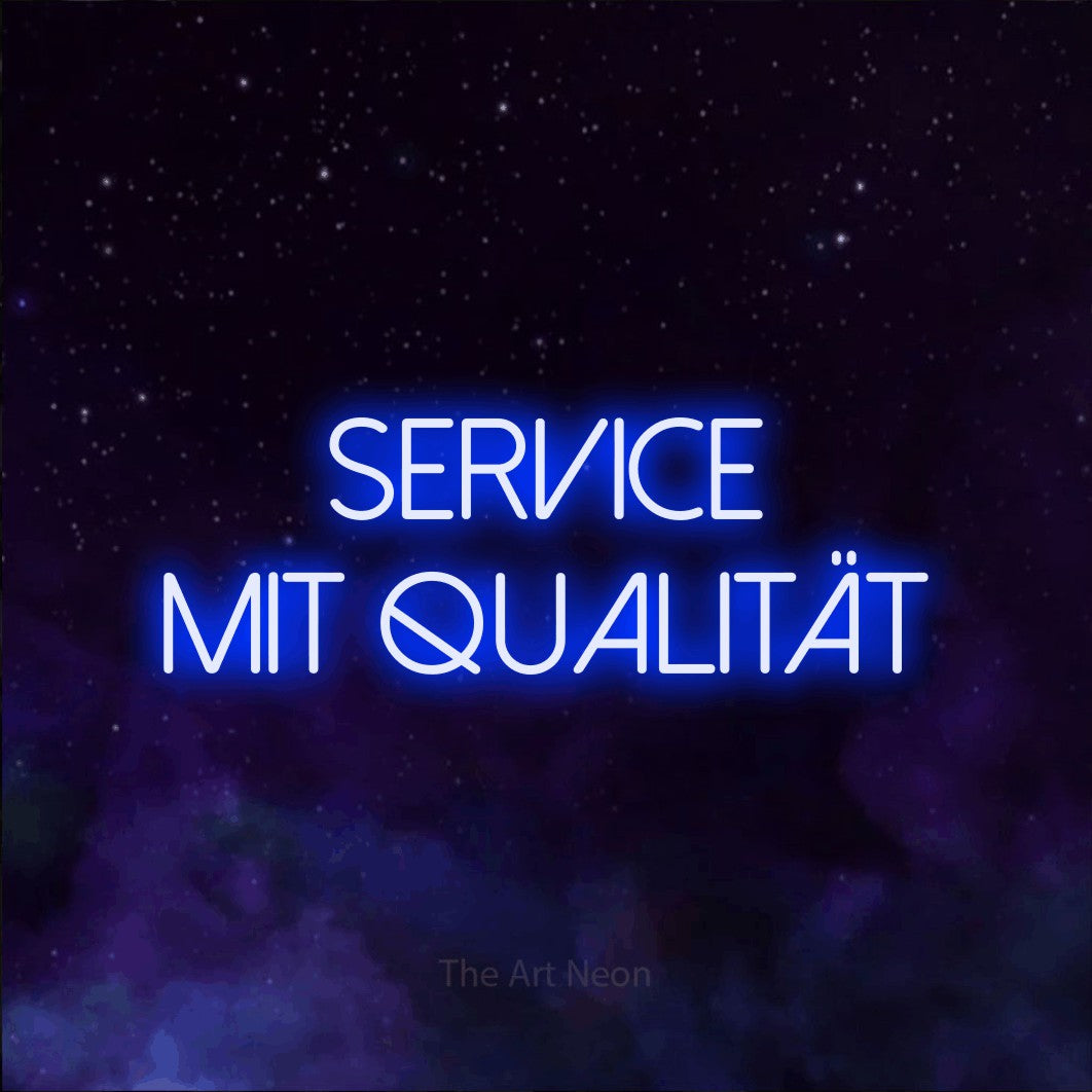 LED neon sign reading “Service mit Qualität”, arranged in 2 lines.