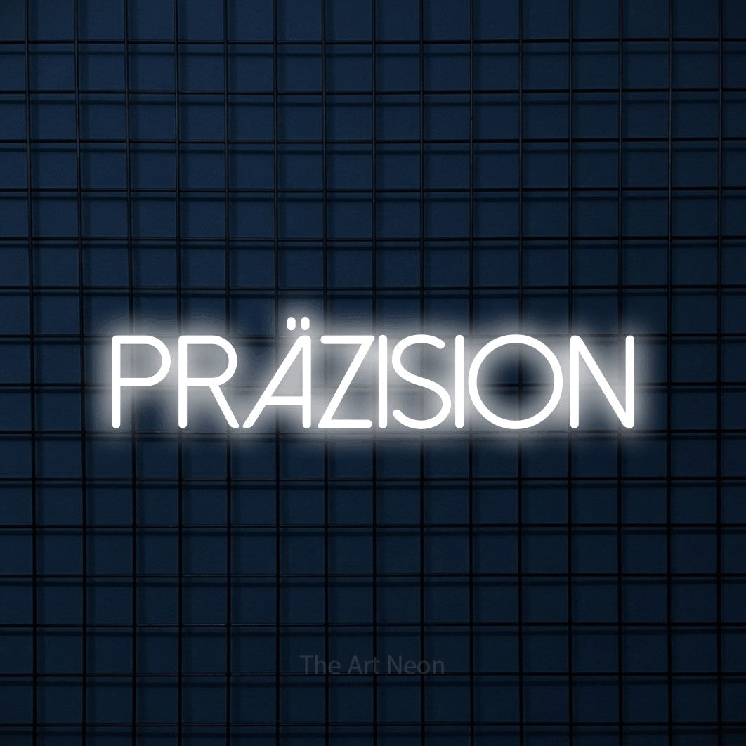 LED neon sign reading “PRÄZISION”, arranged in a single line.