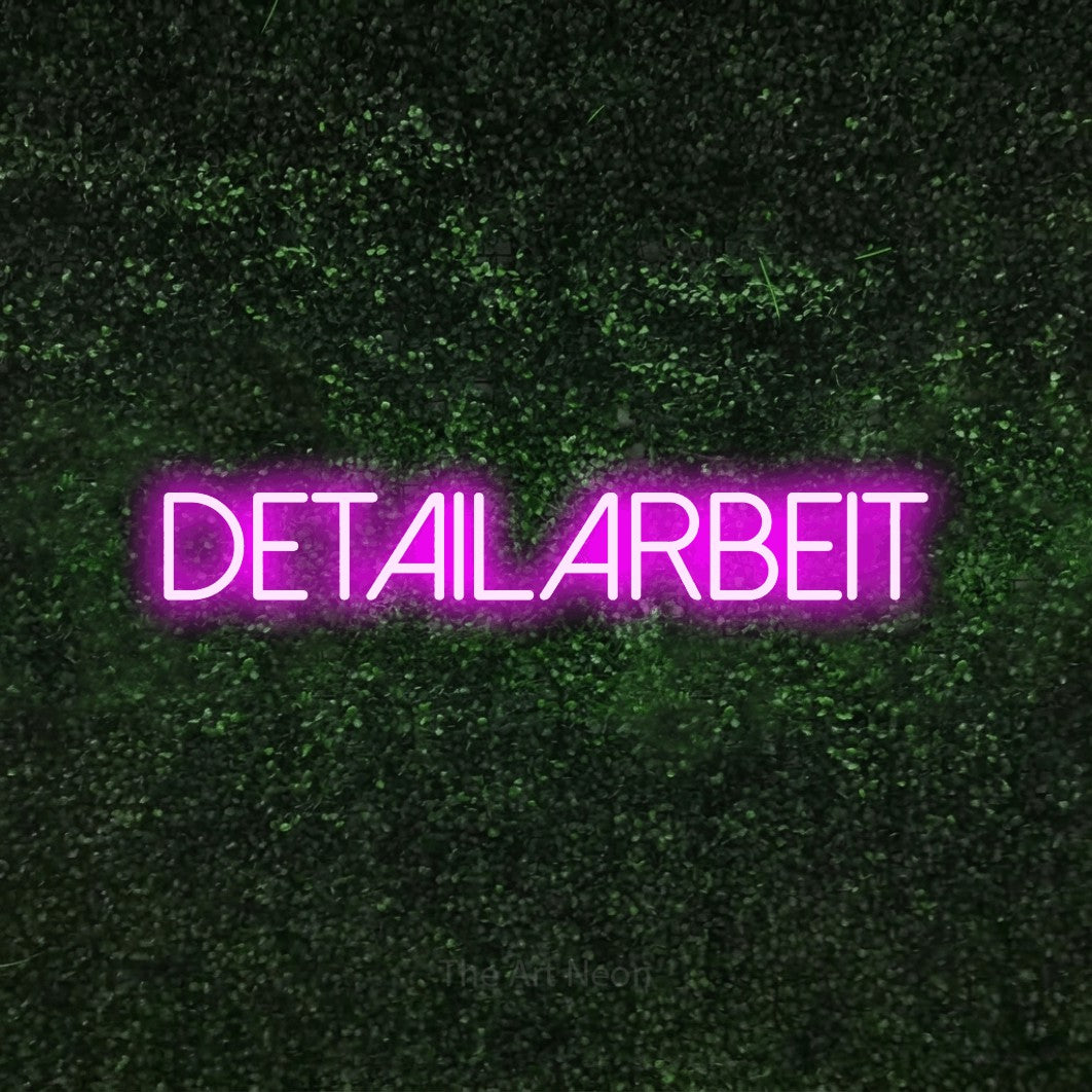 LED neon sign reading “detailarbeit”, arranged in a single line.