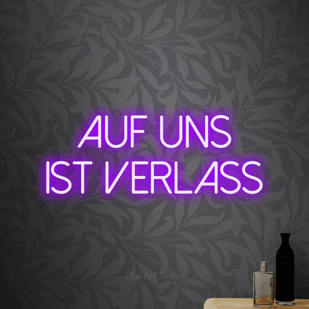 LED neon sign reading “auf uns ist verlass”, arranged in 2 lines.