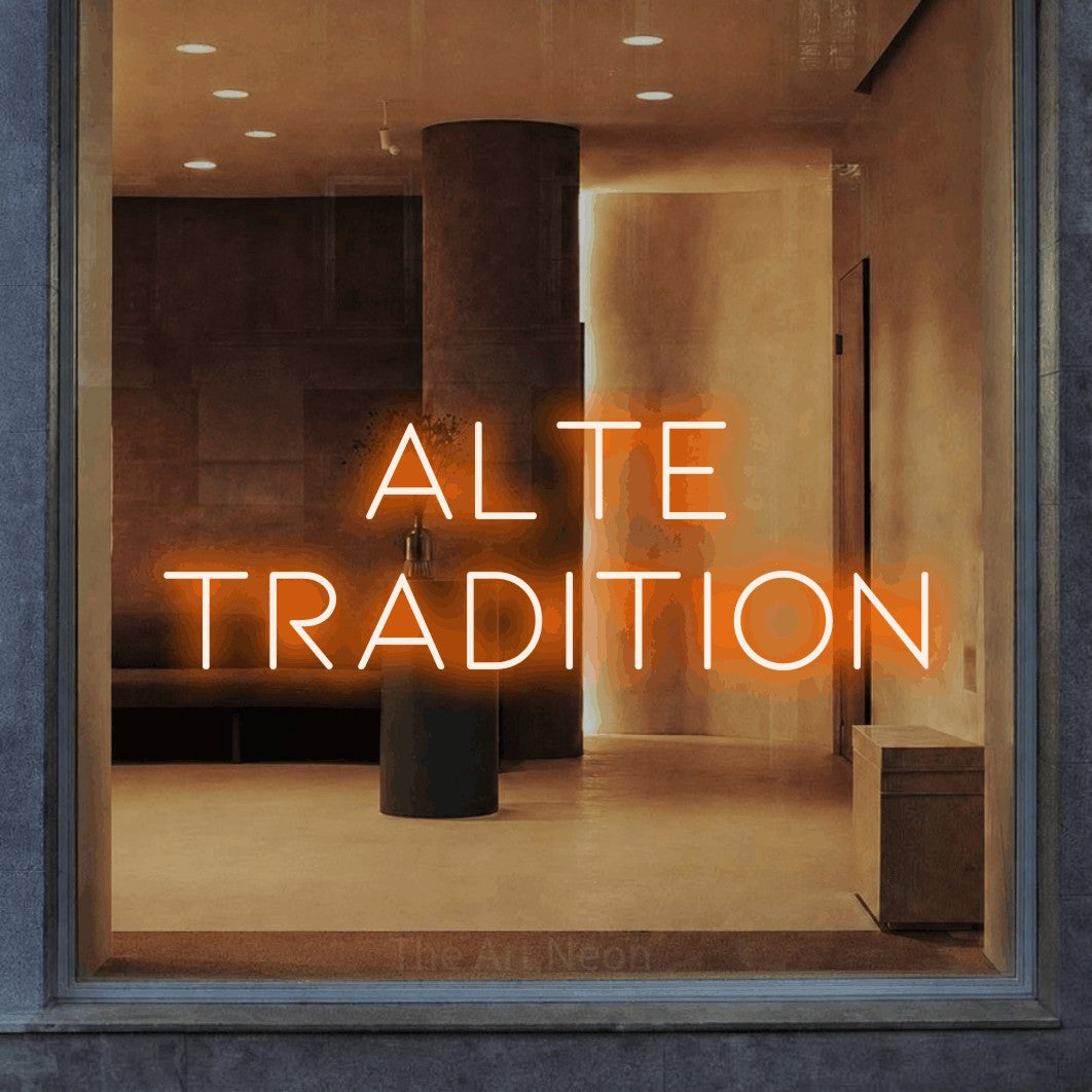 LED neon sign reading “Alte Tradition”, arranged in 2 lines.