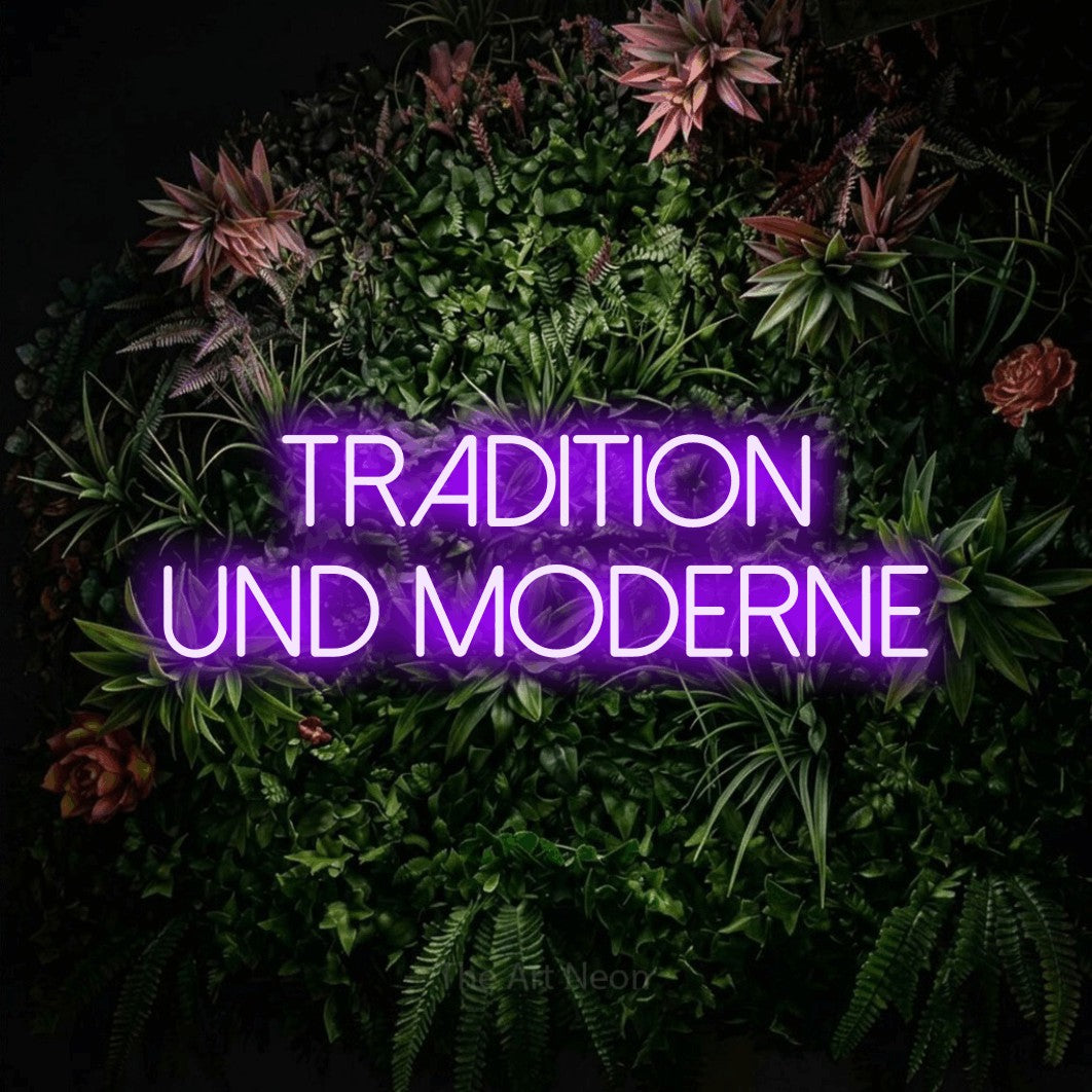 LED neon sign reading “tradition und moderne”, arranged in 2 lines.