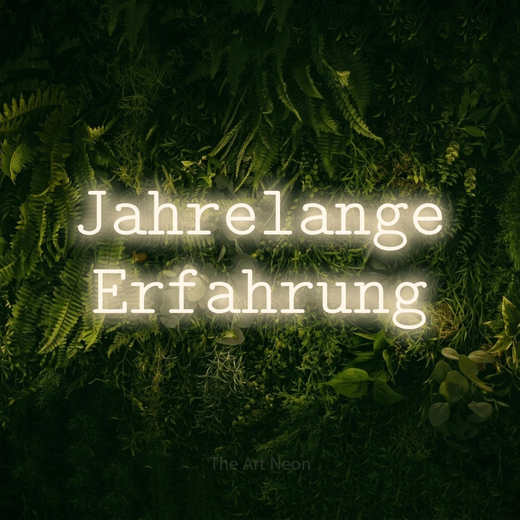 LED neon sign reading “Jahrelange Erfahrung”, arranged in 2 lines.