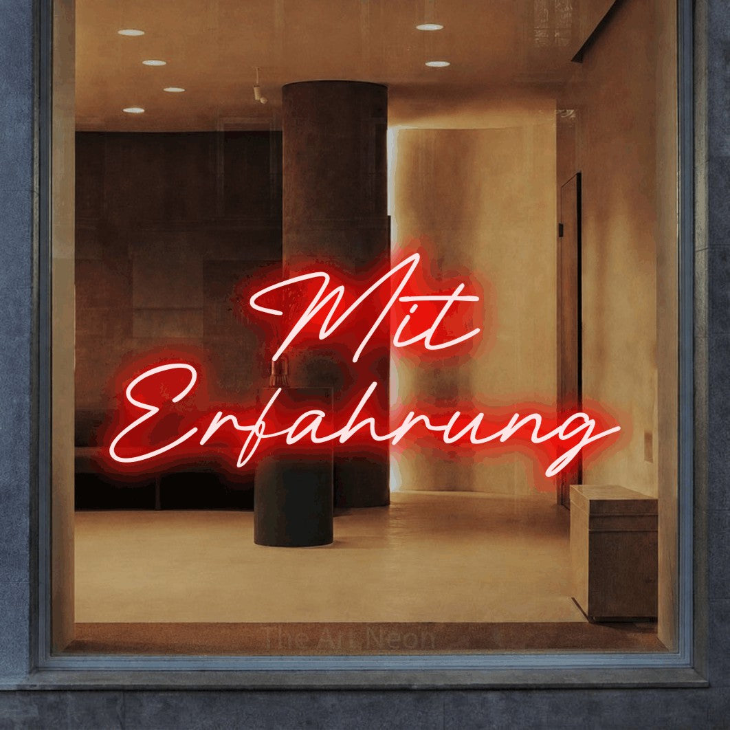 LED neon sign reading “Mit Erfahrung”, arranged in 2 lines.