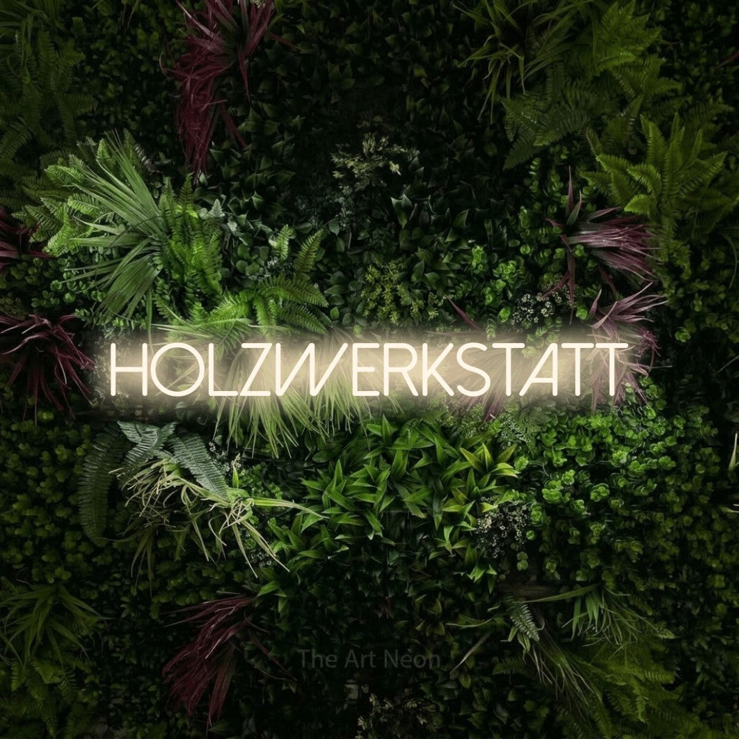 LED neon sign reading “Holzwerkstatt”, arranged in a single line.