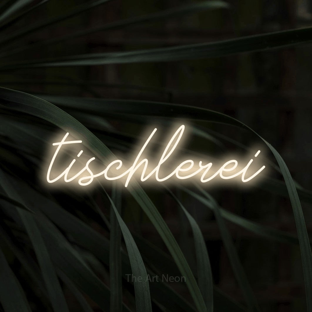 LED neon sign reading “tischlerei”, arranged in a single line.