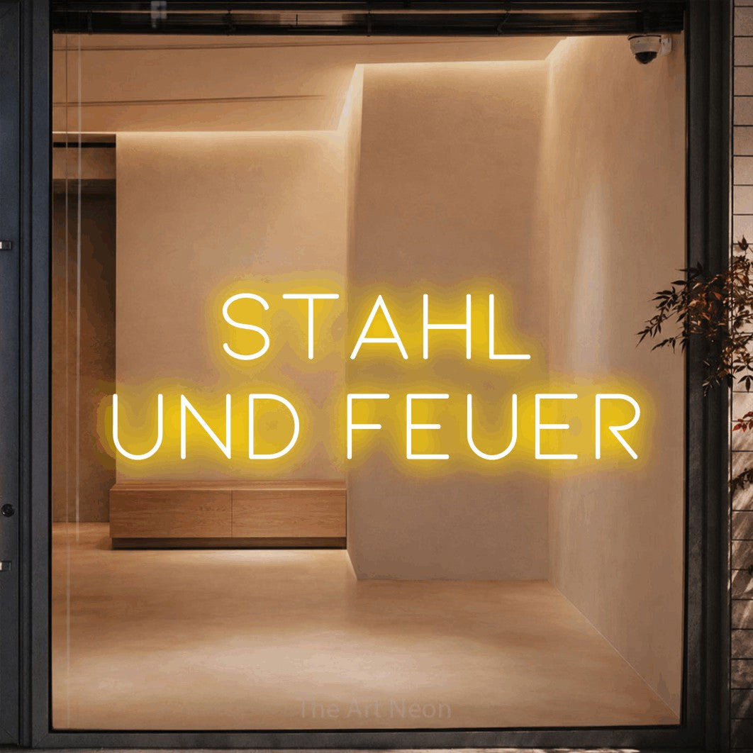 LED neon sign reading “STAHL UND FEUER”, arranged in 2 lines.