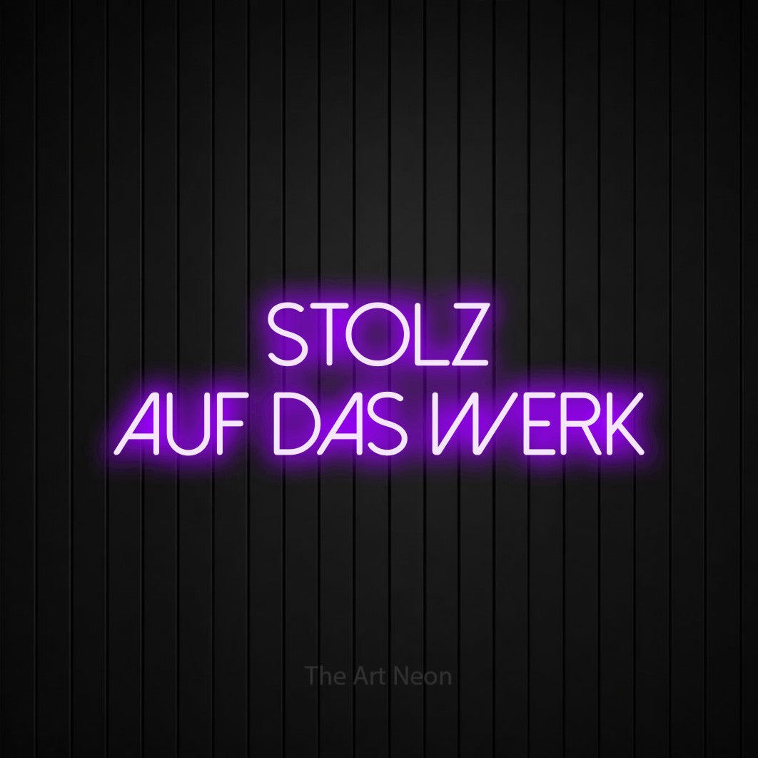 LED neon sign reading “stolz auf das werk”, arranged in 2 lines.