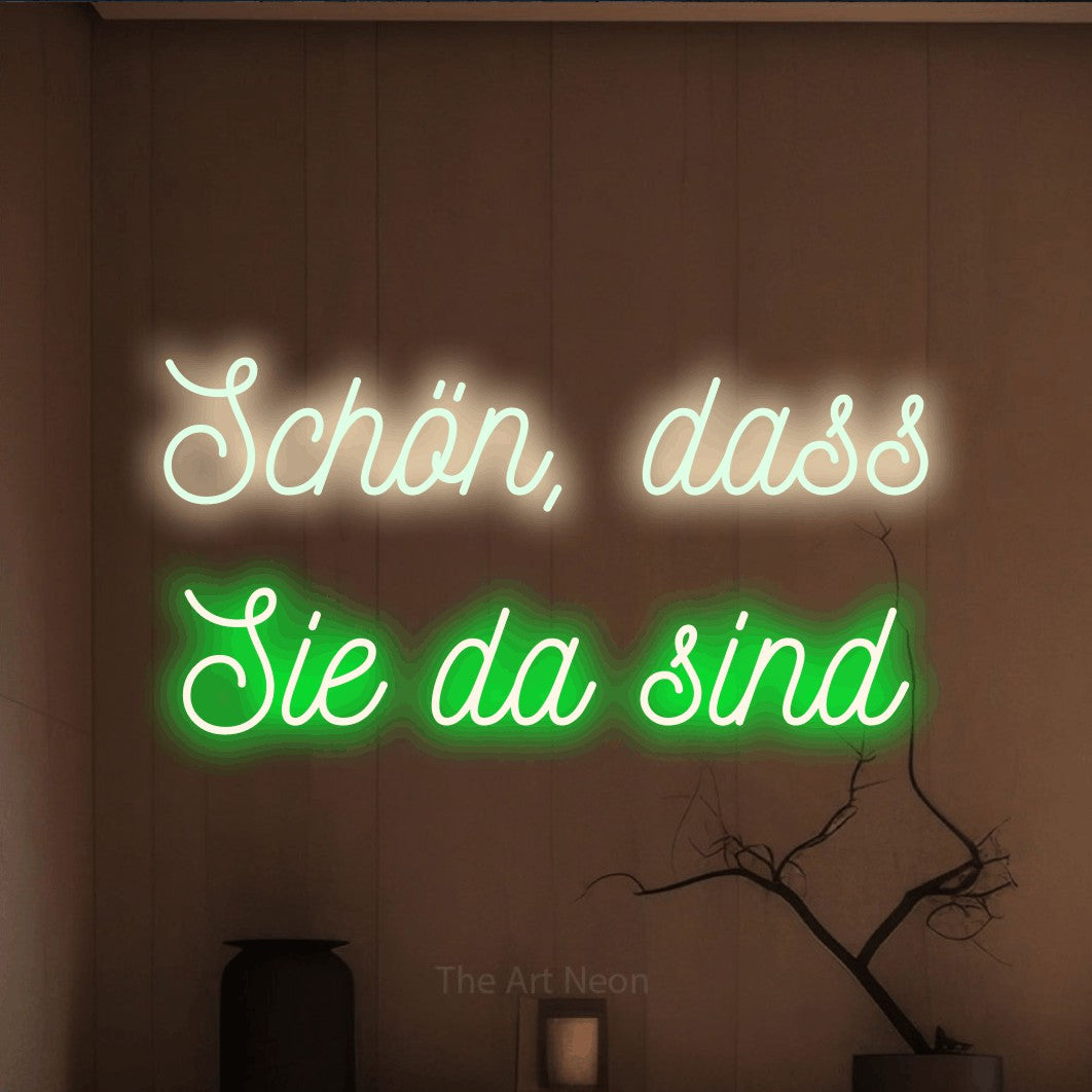 LED neon sign reading “Schön, dass Sie da sind”, arranged in 2 lines.
