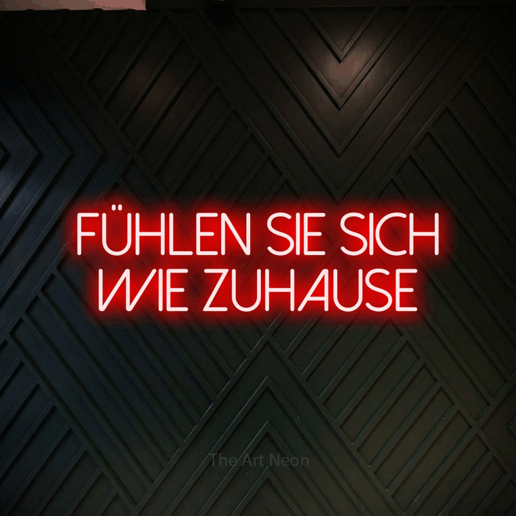 LED neon sign reading “Fühlen Sie sich wie zuhause”, arranged in 2 lines.