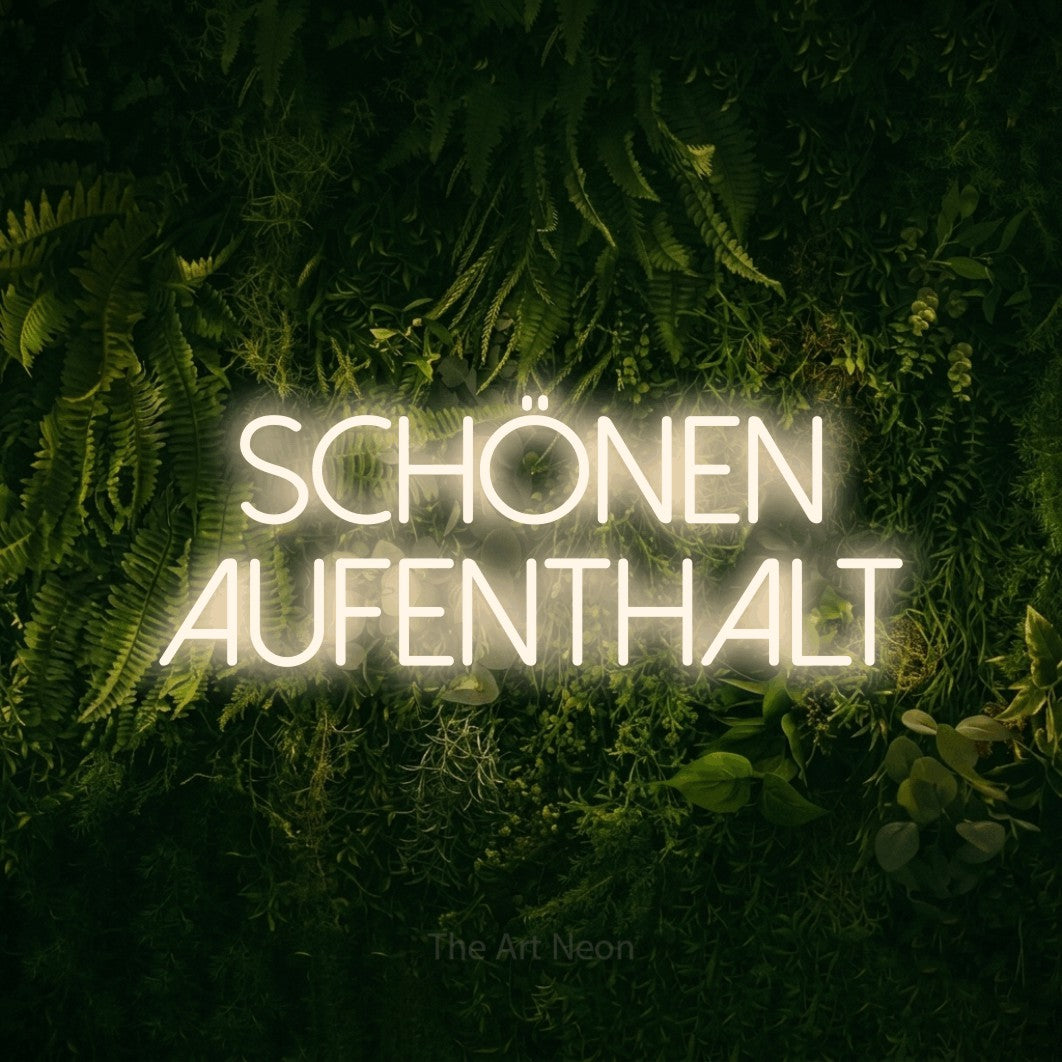 LED neon sign reading “Schönen Aufenthalt”, arranged in 2 lines.