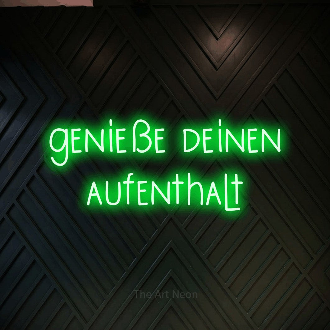LED neon sign reading “genieße deinen aufenthalt”, arranged in 2 lines.