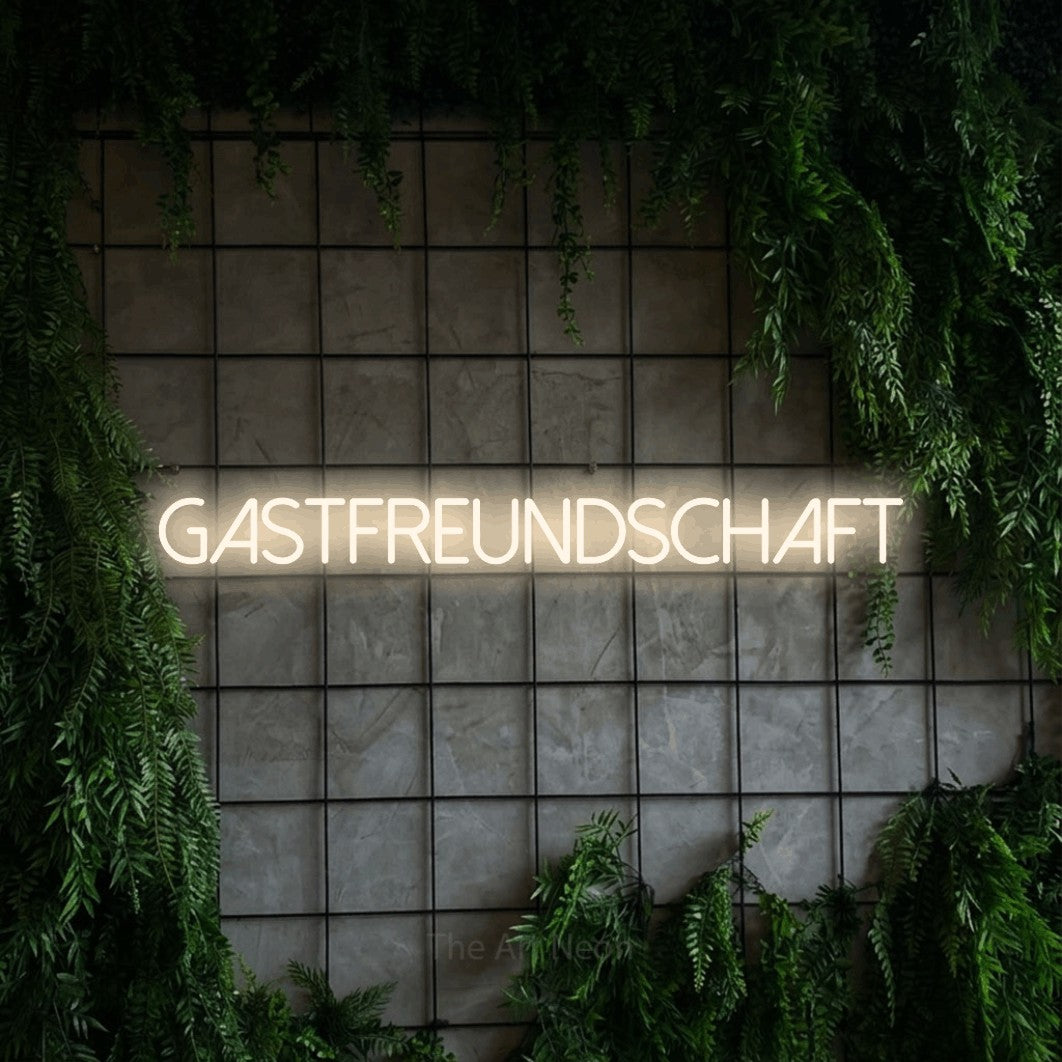 LED neon sign reading “GASTFREUNDSCHAFT”, arranged in a single line.