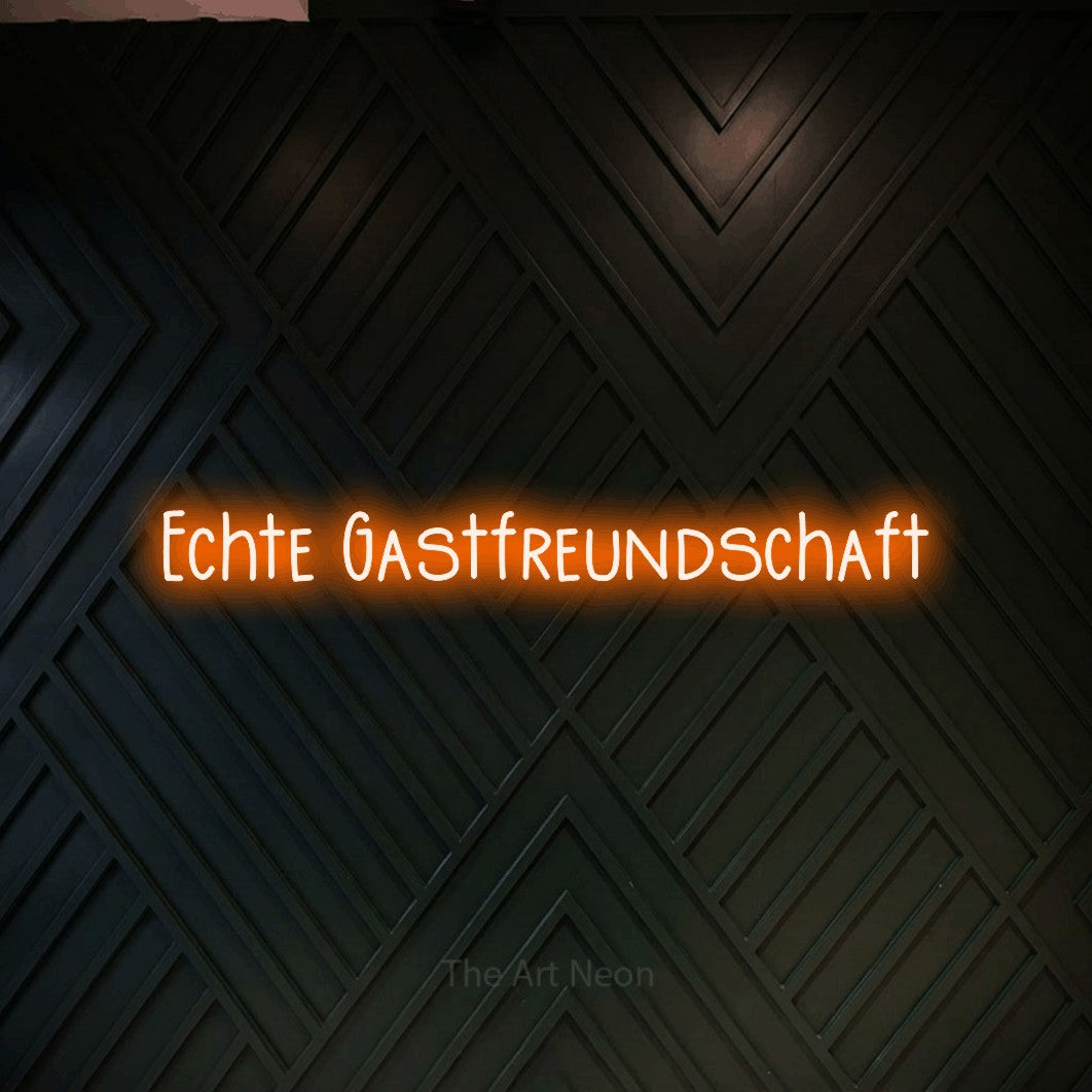 LED neon sign reading “Echte Gastfreundschaft”, arranged in a single line.