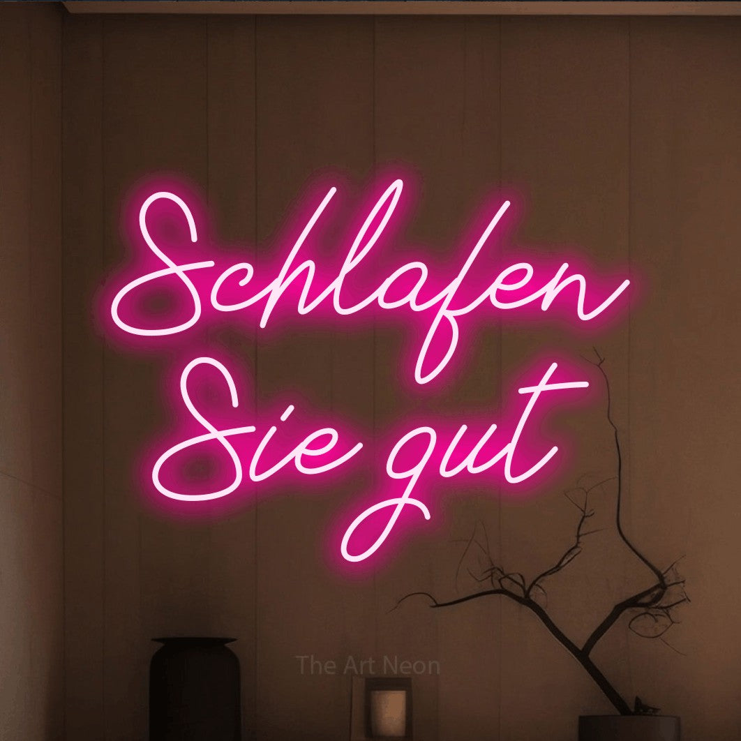 LED neon sign reading “Schlafen Sie gut”, arranged in 2 lines.