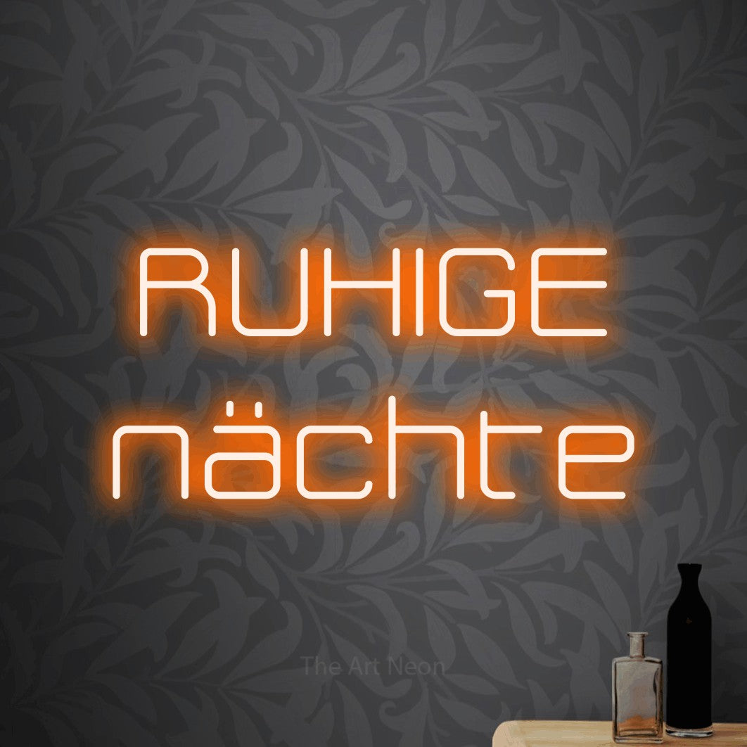 LED neon sign reading “RUHIGE nächte”, arranged in 2 lines.