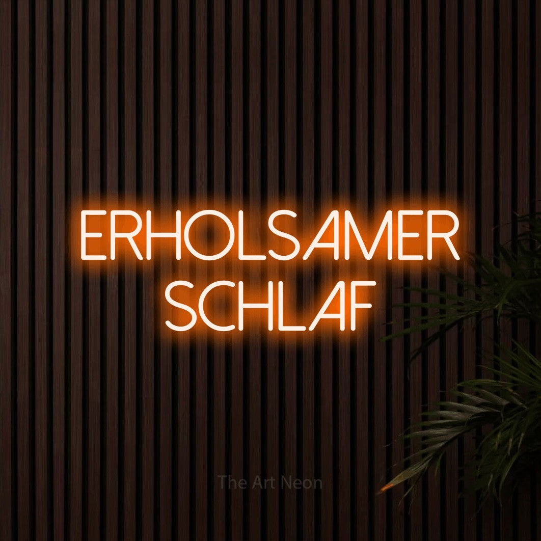 LED neon sign reading “Erholsamer Schlaf”, arranged in 2 lines.